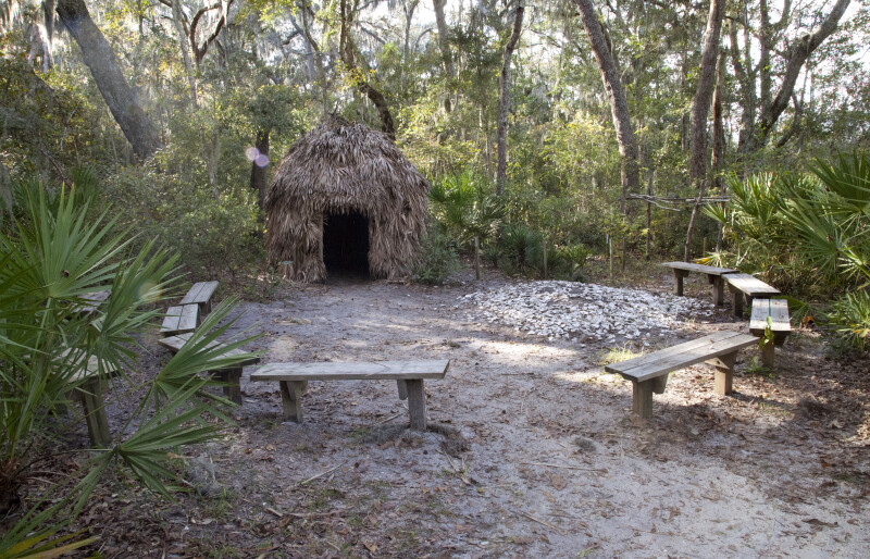 Benches in a Semi-Circular Arrangement in Front of a Reconstructed Timucuan Hut
