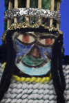 Bermuda Male Gombey Dancer with Traditional Painted Mask, and Headdress with Feathers (Close Up)