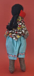 Bolivia Handcrafted Doll of Woman Made of Stuffed Woven Material. (Back View)