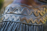 Bronze Clothing Detail