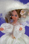 Brussels Plastic Doll with Feather Hat and Pearl Earrings (Close Up)