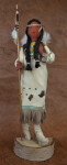 Canada Ontario Tall Indian Woman Wearing Soft Leather Dress and Holding a Wood Staff with Feather (Full View)
