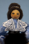 Canada Wooden Doll Dressed in Blue Brocade Dress and Holding a Fur Muff (Close Up)