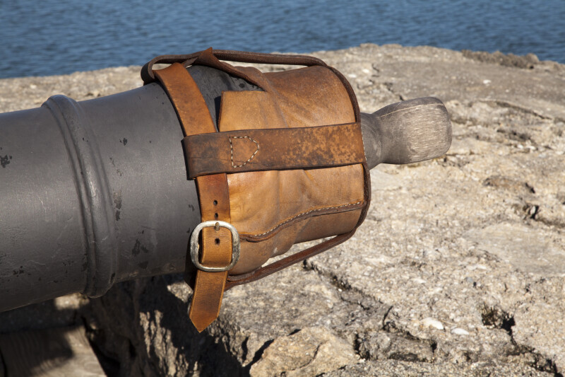 Cannon with a Leather Covering Strapped Over the Opening of the Barrel, Close-up