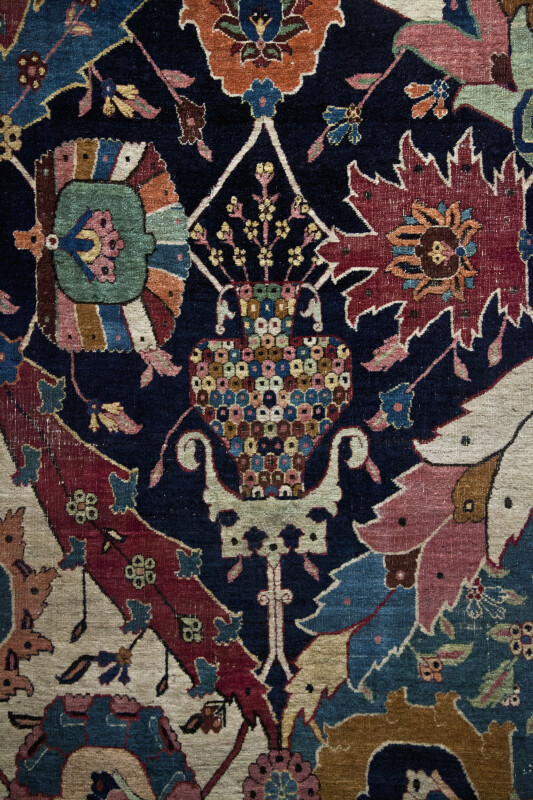 Carpet with a Vase Stitched Into Its Center