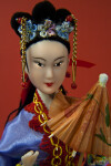 China Doll from Hong Kong with Ornamental Hair Piece and Parasol (Close Up)