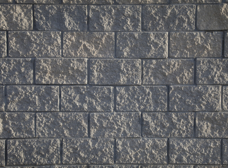 Concrete Wall Arranged in Bricks