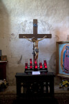 Crucifix with Candles at Mission Concepción Belfry