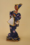 Cuba Handcrafted Doll Holding Woven Basket with Fruit (Three Quarter View)