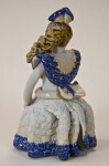 Dominican Republic Ceramic Doll with a Bow in Her Hair and a Large Bow at the Back of Her Dress (Back View)