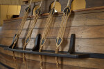 Fiber Ropes Attached to the Hull of a Ship