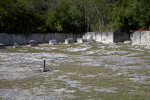 Field of Rock Sediments Surrounded by Quarry Walls