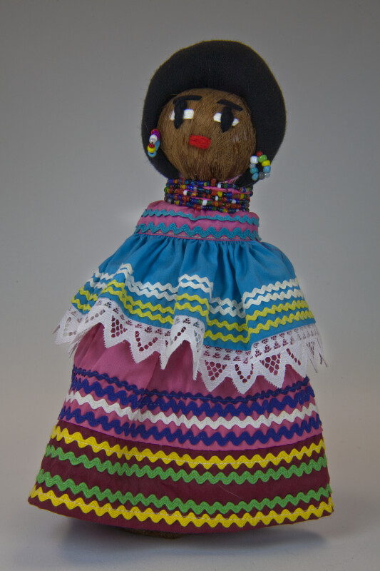 Florida Seminole Indian Doll Made from Palmetto Fiber Wearing Bright Dress with Rick Rack (Full View)