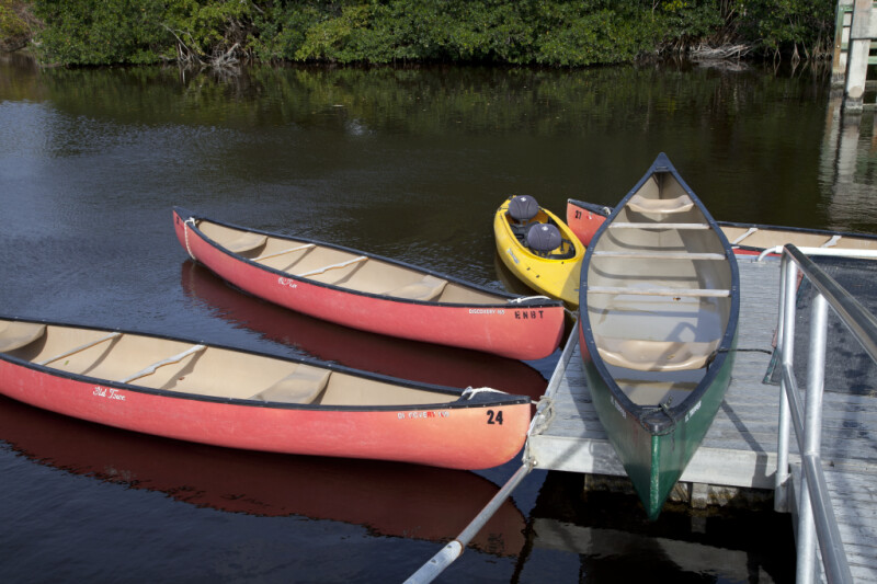 Four Canoes and One Kayak Docked at the Flamingo Marina of Everglades National Park