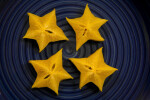 Four Starfruit Cut into Star Patterns