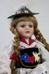 Germany Girl Wearing Traditional Dirndl, Apron, Shawl, and Hat (Close Up)