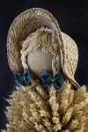 Germany Hand Made Woman with Burlap Face and Straw Braids under Straw Hat (Close Up)