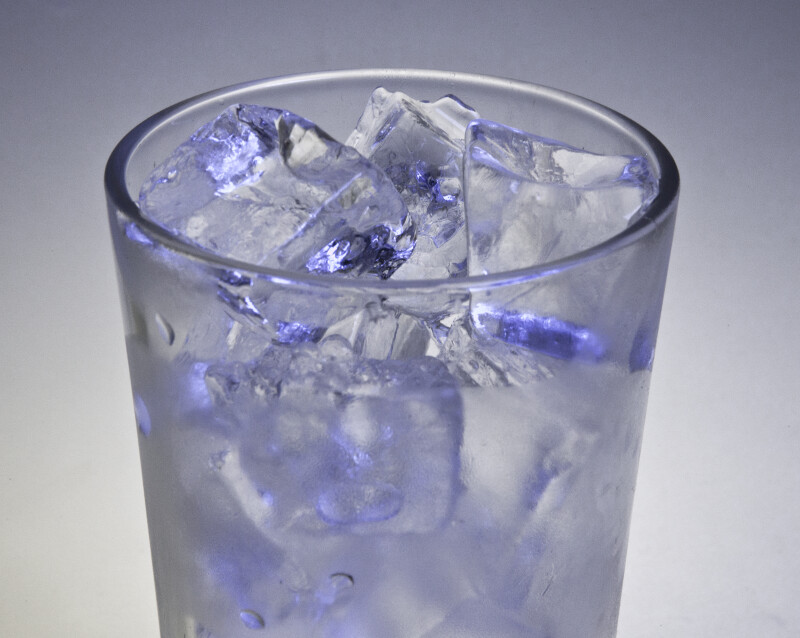 Glass of Ice Cubes with Blue Cast