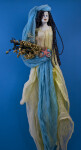 Greece Beautiful Lady Wearing a Linen Dress and Holding a Bouquet of Dried Flowers and Shells (Full View)