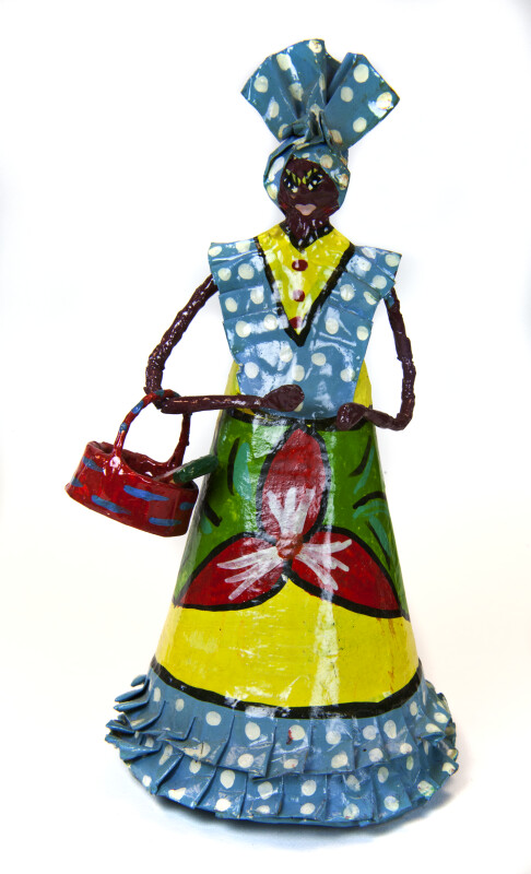 Guadeloupe Handcrafted Woman Holding a Basket with Watermelon (Full View)