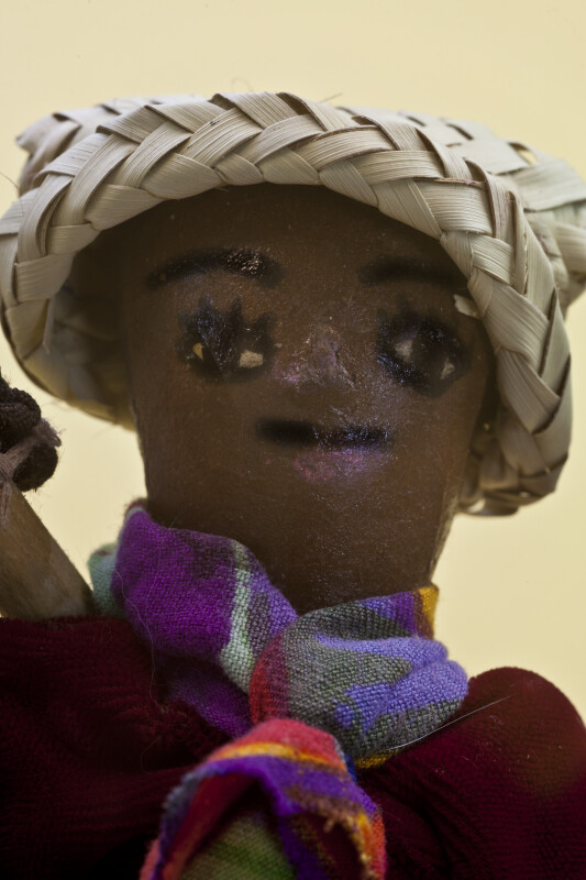 Haitian Gardener's Hand-Painted Face on Paper Mache (Close Up)