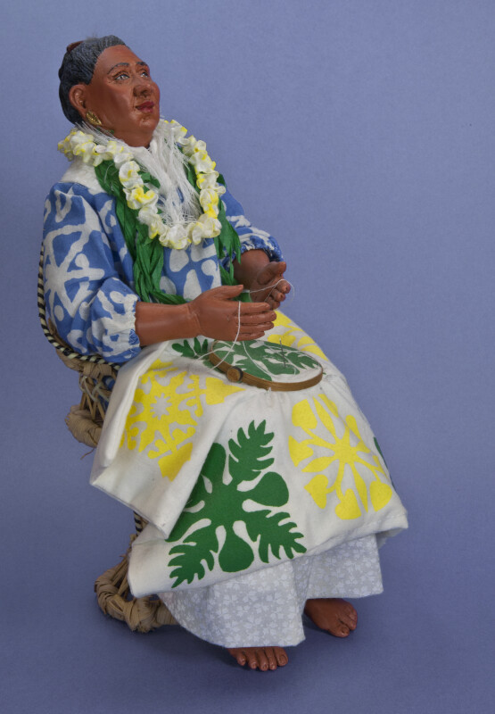 Hawaii Handcrafted  Lady Making a Quilt with Wooden Embroidery Hoop (Three Quarter View)