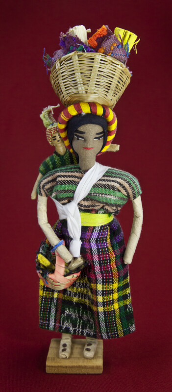 Honduras Lady Made from Fabric with Straw Basket on her Head (Full View)