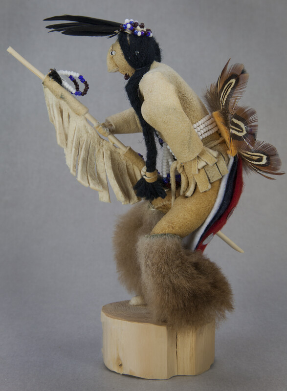 Idaho Shosone Indian Doll Wearing Fur Leggings, Leather Shirt, and Full Feather Bustle (Side View)