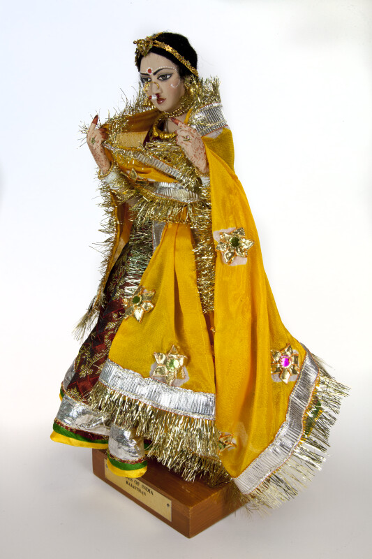 India Traditional Wedding Costume with Golden Veil on Doll from India (Three Quarter View)