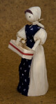 Iowa Female Doll Made from Corn Husks Holding Corn Husk Basket (Three Quarter View)