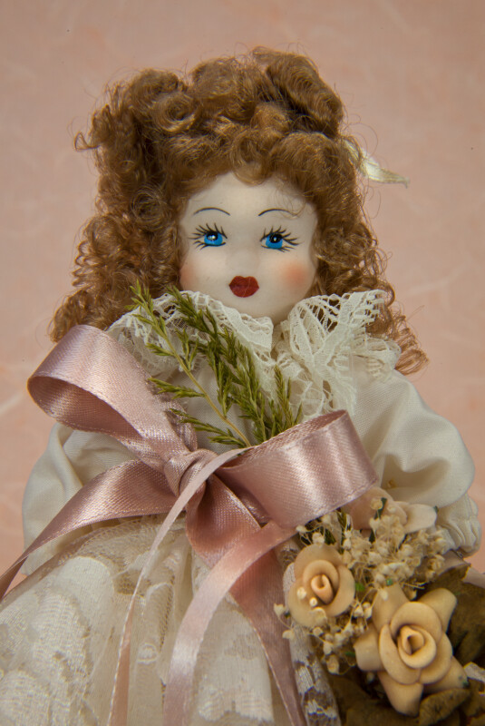 Italy Handcrafted Italian Lady Holding Bouquet of Artificial Flowers and Ribbons  (Close Up)