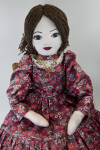 Kansas Female Doll with Yarn Hair, Red Stone Earrings and Necklace (Close Up)