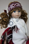 Latvia Girl Wearing Traditional Clothing with Blanket Pinned Over Her Shoulder (Close Up)