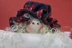 Louisiana Doll with Wood Bead for Head, Print Cap, and Synthetic Hair (Close Up)