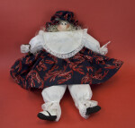 Louisiana Girl Doll Made from Wood and Stuffed Material Wearing a Cotton Dress and Pantaloons (Full View)