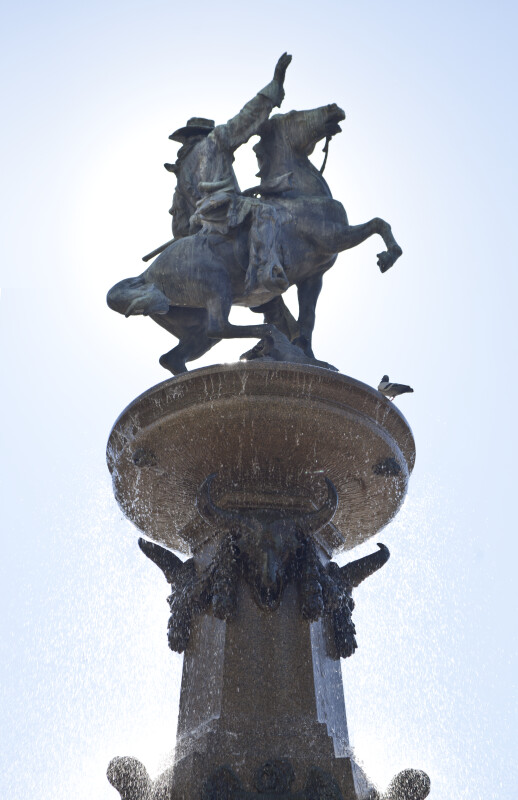 Man on Horseback at Fountain