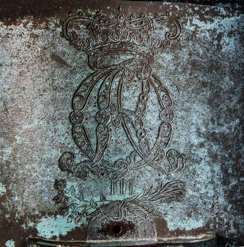 Metal Carving on a Bronze, Oxidized Mortar at Castillo de San Marcos