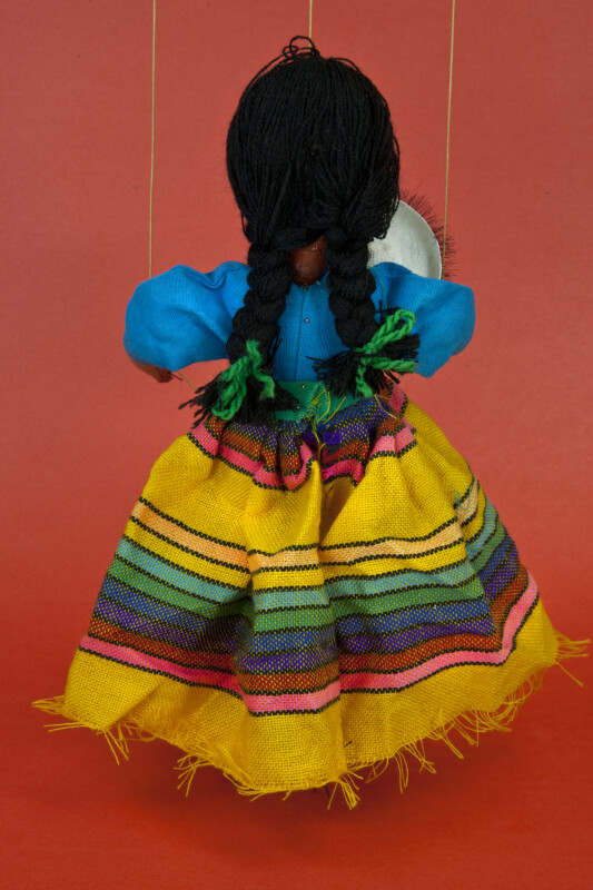 Mexico Handcrafted Marionette with Long Black Braids and Striped Skirt (Back View)