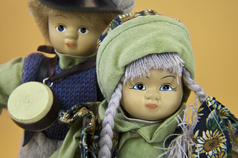 Norway Photo of Girl and Boy with Ceramic Heads and Yarn Hair  (Close Up)