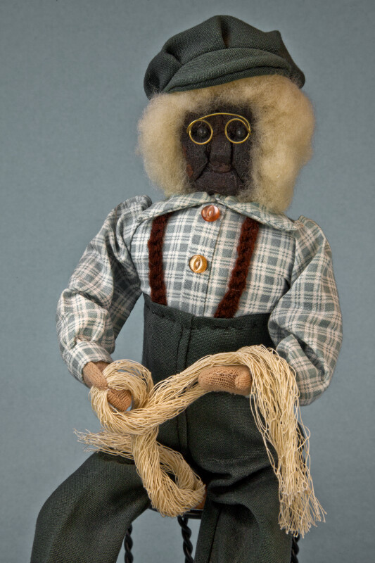 Nova Scotia Male Doll with Applehead Who is Holding a Fisherman's Net (Three Quarter Length)