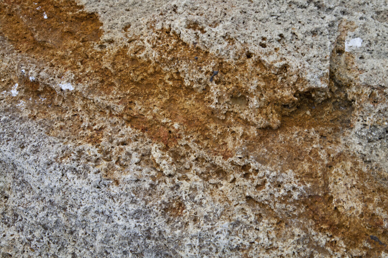 Orange and Grey Colors on a Porous Rock
