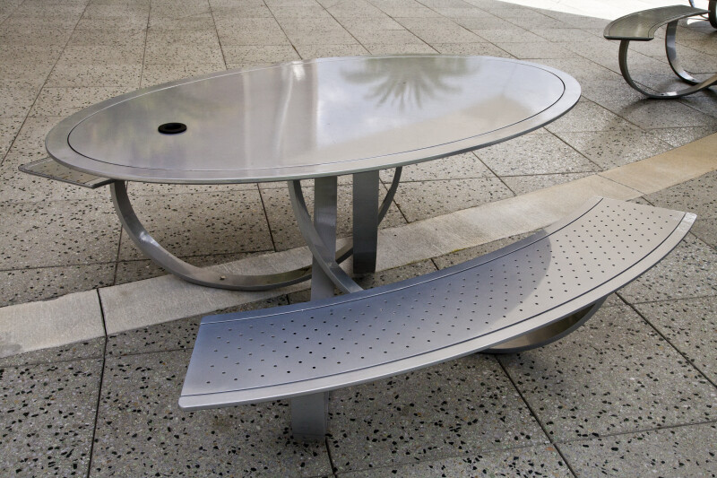 Oval Metal Table with Curved Benches