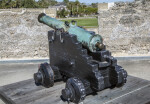 Oxidized, Bronze Cannon on a Wooden Firing Step