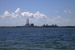 Picture Taken From a Boat of Man-Made Structures on the Shore