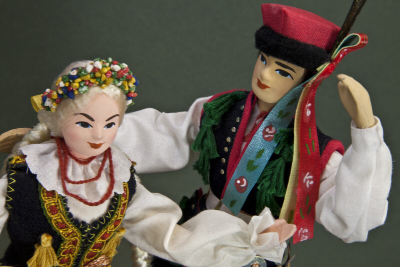 Poland Folk Dancers with Hand Painted Faces from Krakow (Close Up)