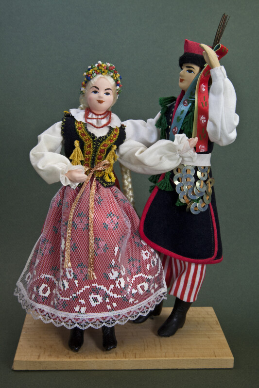 Poland Male and Female Ethnic Dancers Wearing Traditional Costumes (Full View)