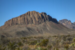 Portion of a Mountain Beyond Dry Desert Shrubs