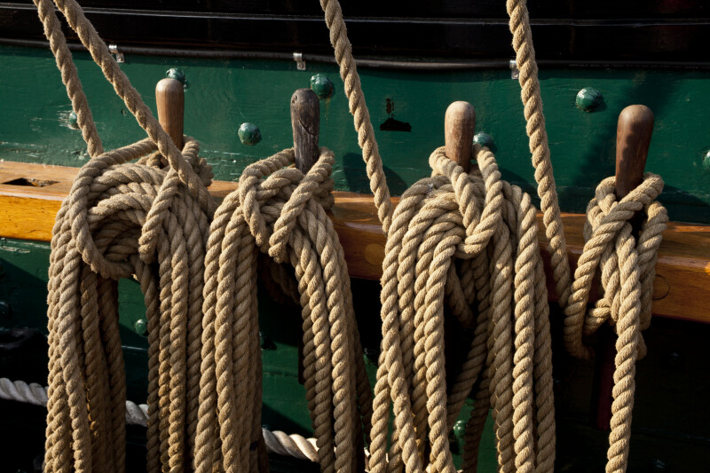 Ropes Tied to Wooden Pegs