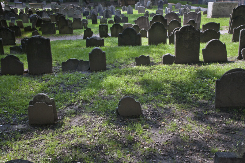 Rows of Shouldered Tablet Headstones in a Cemetery