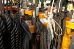 Ship's Cordage Tied Off on a Wooden Rack